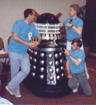 Fred the Dalek at TARDIScon 1989 with Colin Baker, Michael Keating and John Leeson