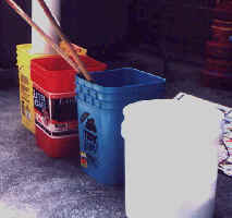 soda-ash solution in buckets